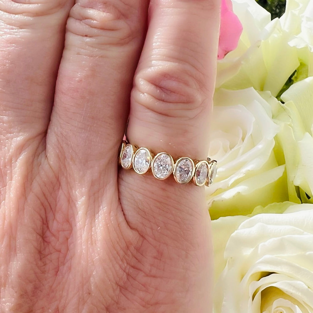 Incredible Yellow Gold Oval Diamond Eternity Band