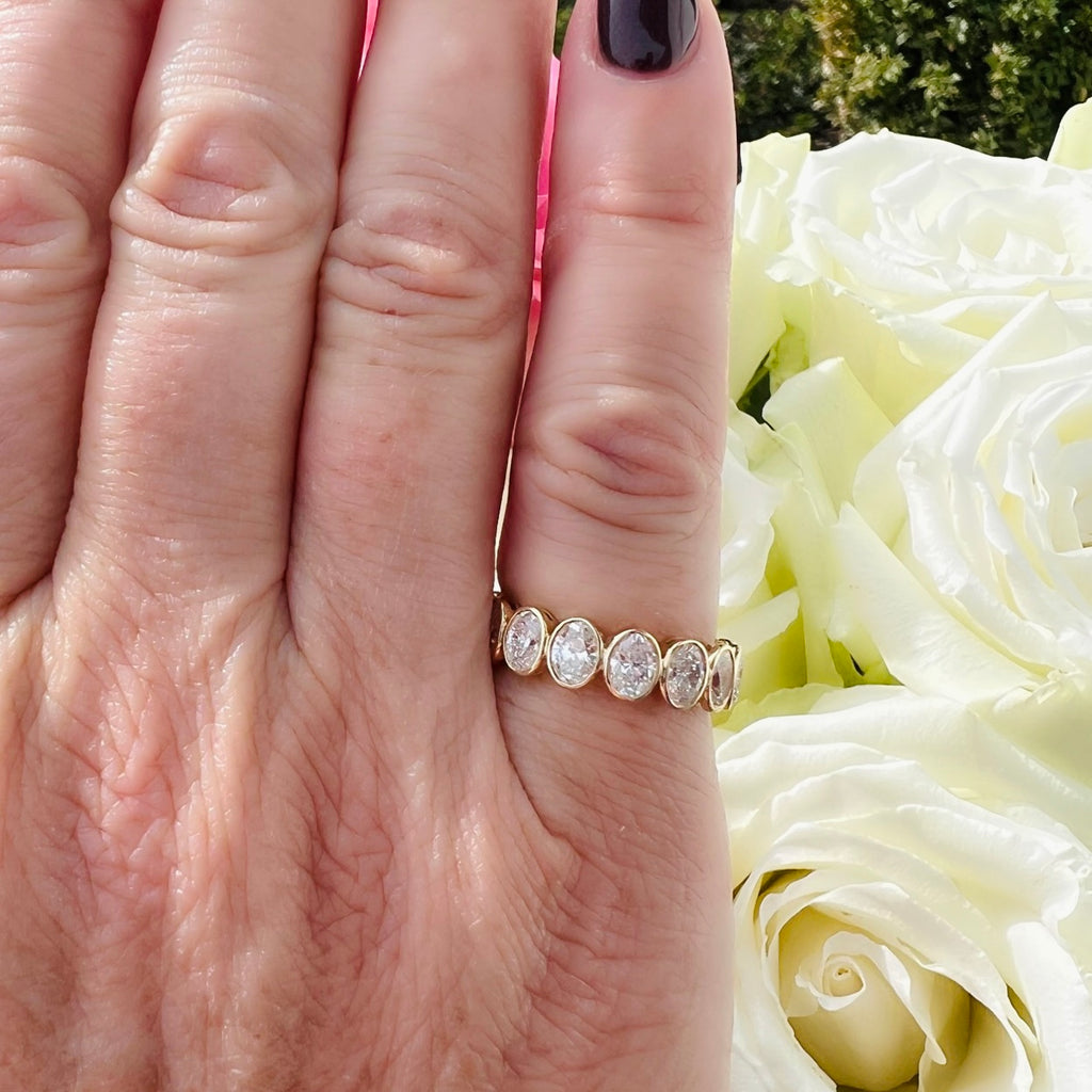 Incredible Yellow Gold Oval Diamond Eternity Band