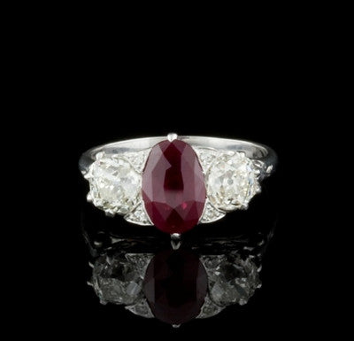 1.34ct Oval Ruby & Diamonds 18KT Ring