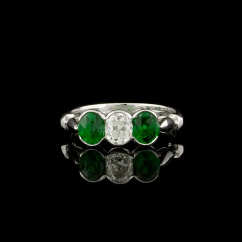 Oval Tsavorite Flanked Diamond Ring