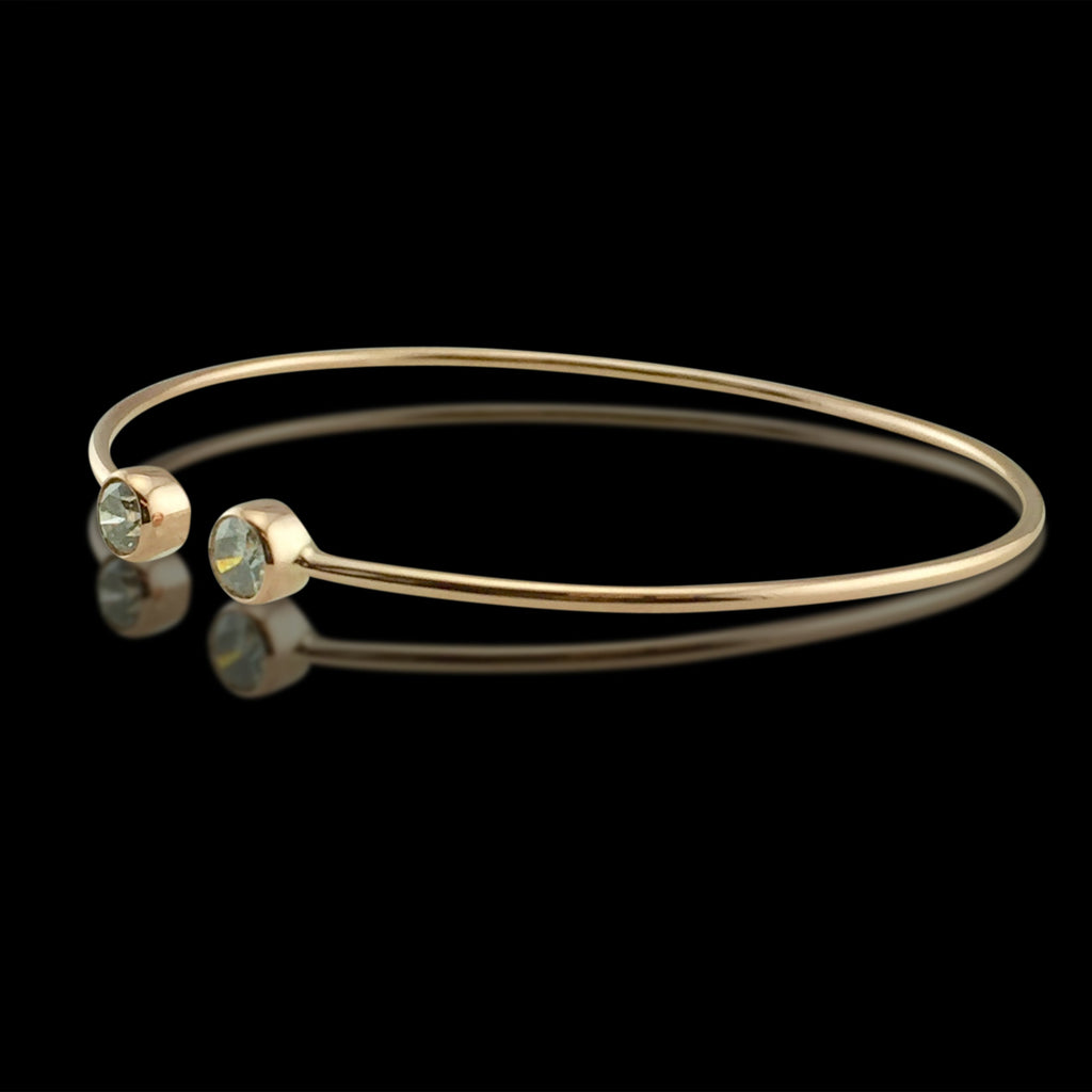 Rose Gold Bangle Featuring Two Round Brilliant Cut Diamonds