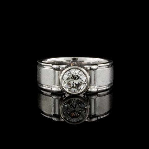 0.87ct tw Round Bezel Set Diamond Ring