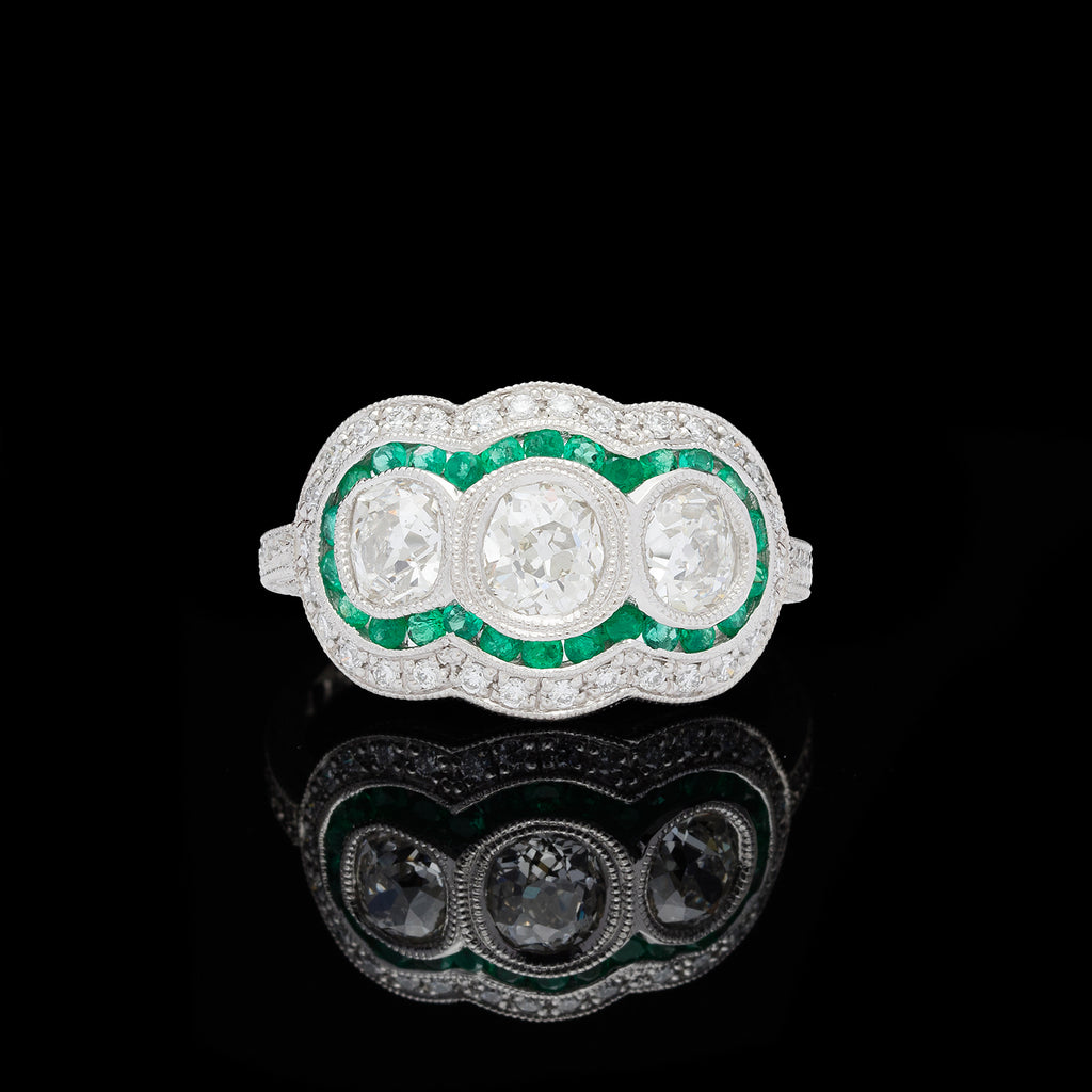 Three Stone Old Euro Diamond Ring with Emerald Halo