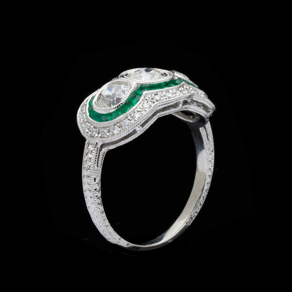 Three Stone Old Euro Diamond Ring with Emerald Halo