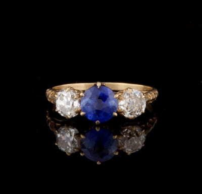 1.07ct Round Sapphire & Diamond 18KT Ring