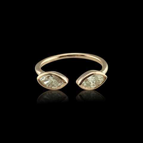 18kt Rose Gold Custom Ring Featuring Two Marquise Cut Diamonds