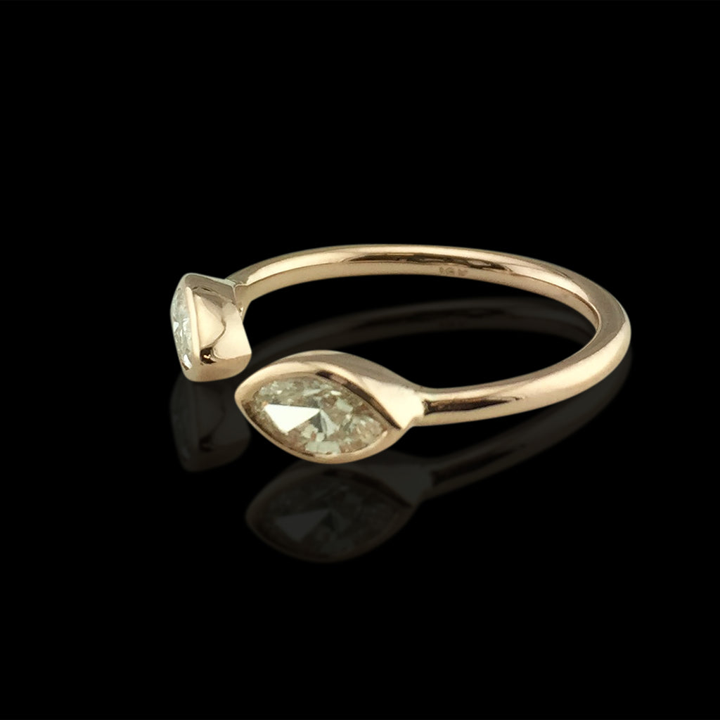 18kt Rose Gold Custom Ring Featuring Two Marquise Cut Diamonds