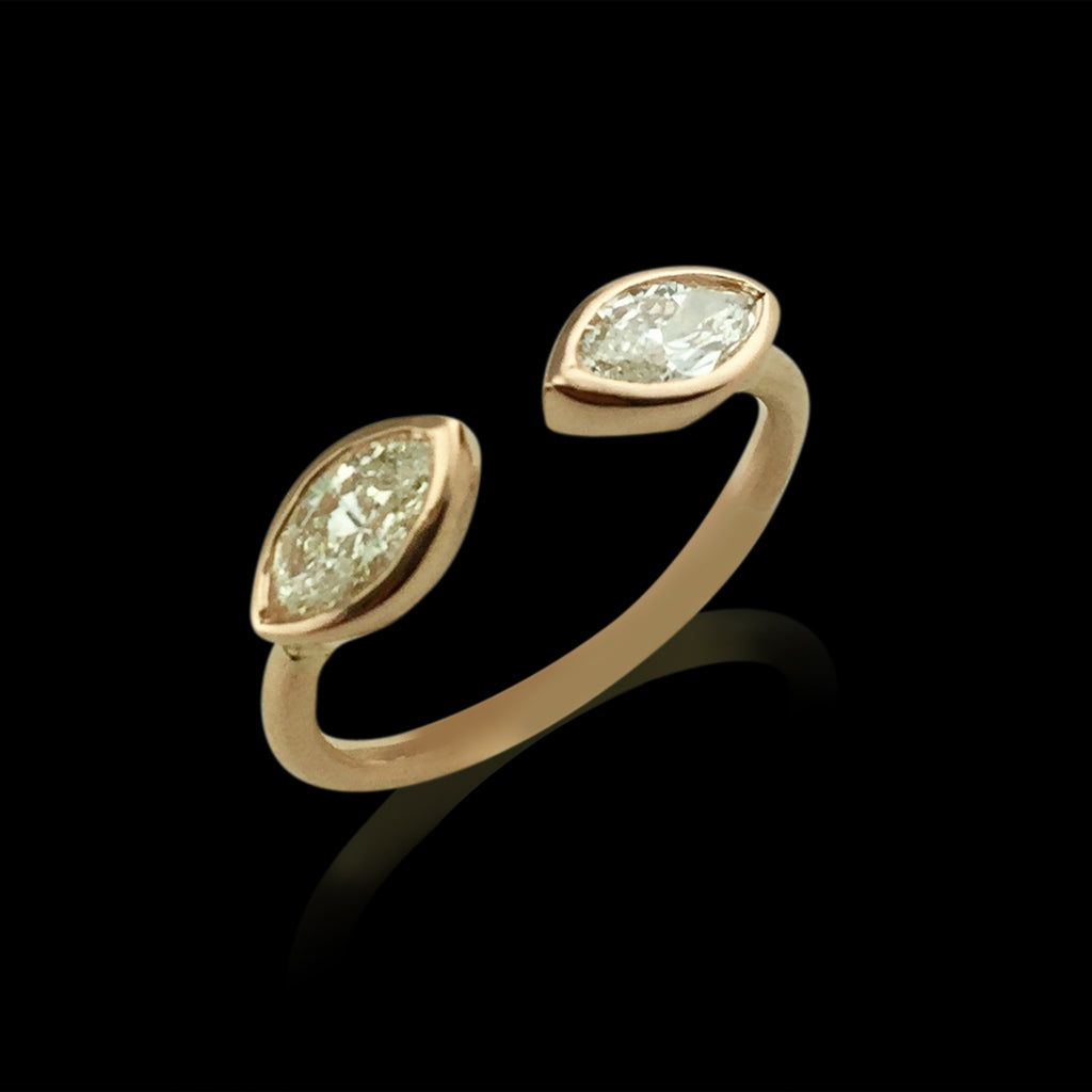 18kt Rose Gold Custom Ring Featuring Two Marquise Cut Diamonds