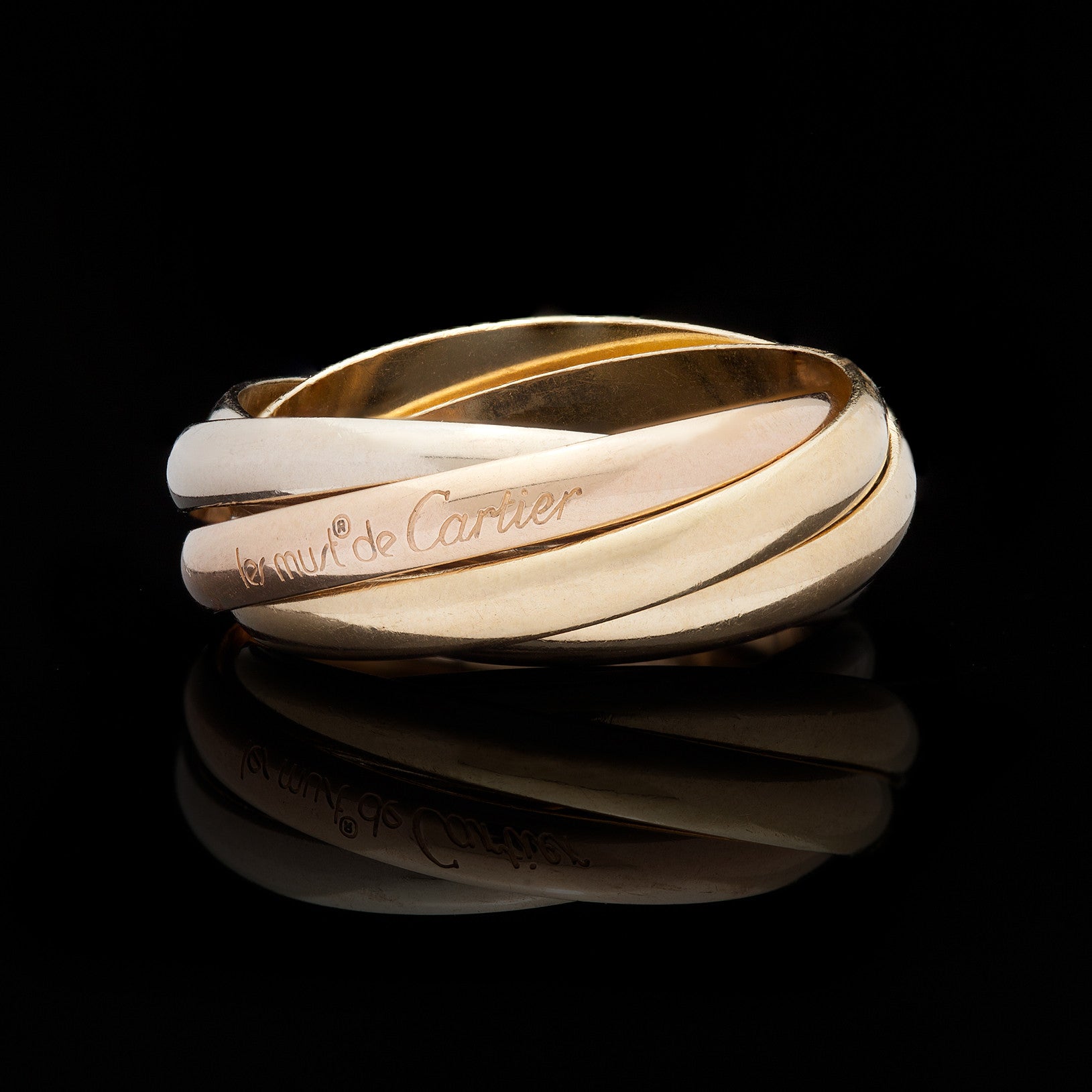 les must de Cartier Trinity Tri-Gold Band Ring - Main Image