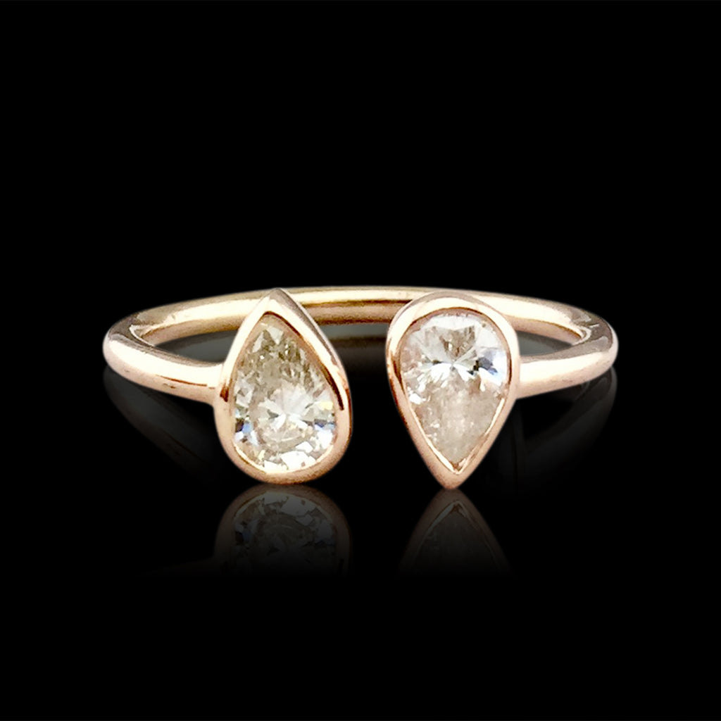 Custom Rose Gold Ring Featuring Two Pear Shaped Diamonds
