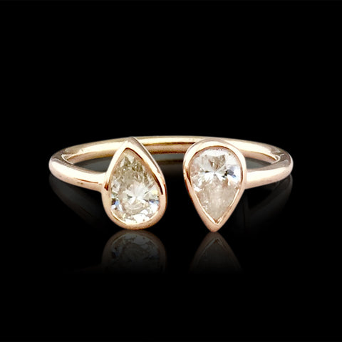 Custom Rose Gold Ring Featuring Two Pear Shaped Diamonds