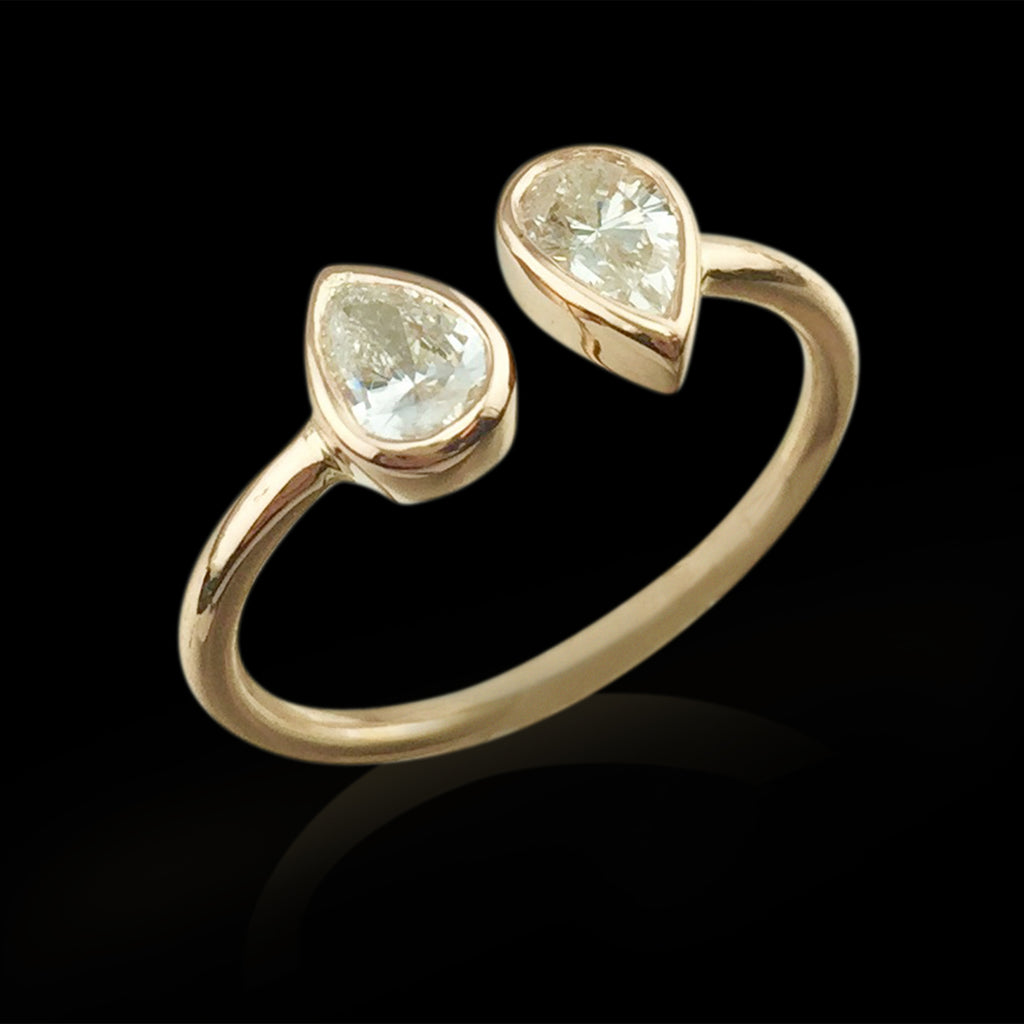 Custom Rose Gold Ring Featuring Two Pear Shaped Diamonds
