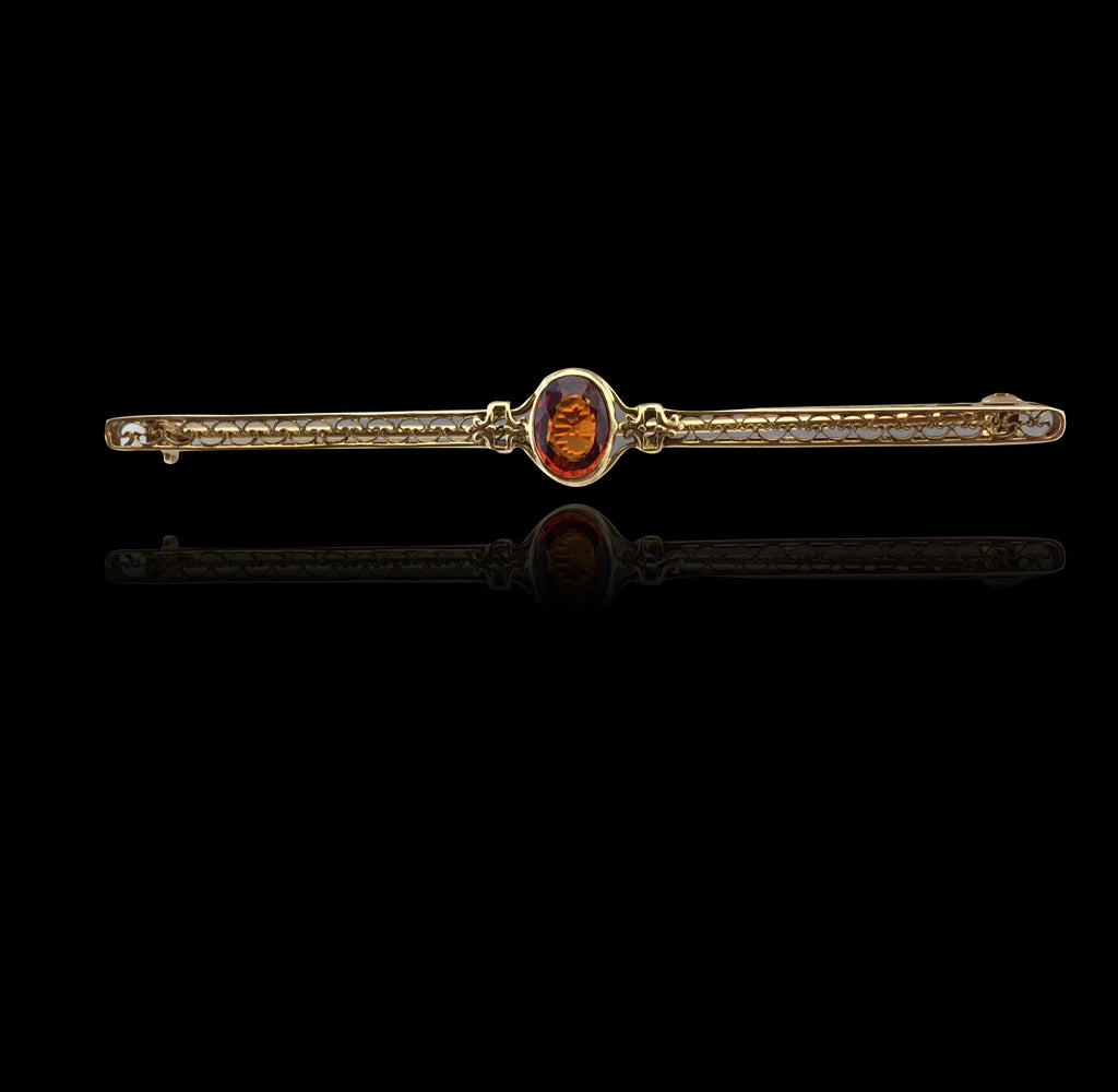 Antique Gold Pin Featuring Oval Orange Garnet