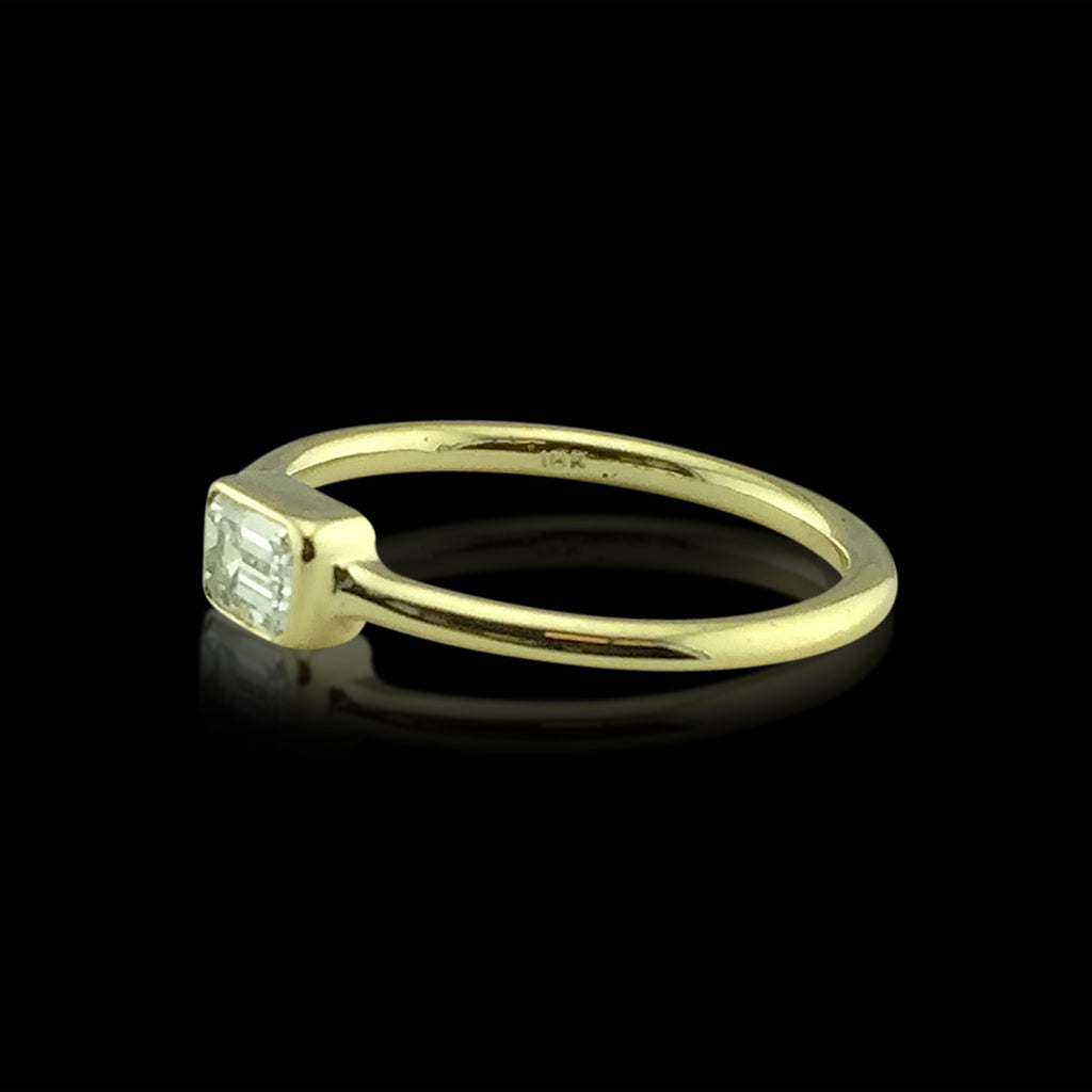 18kt Yellow Gold Ring Featuring Horizontal Set Emerald Cut