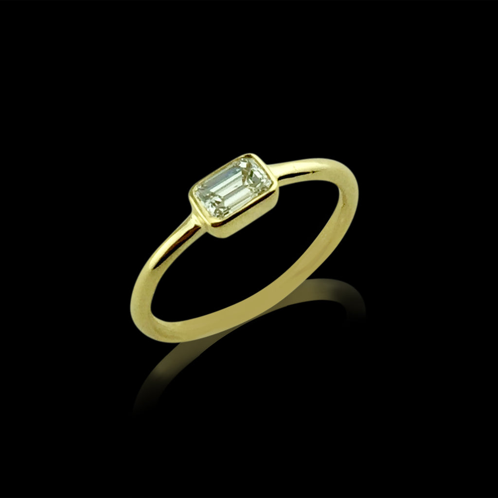 18kt Yellow Gold Ring Featuring Horizontal Set Emerald Cut