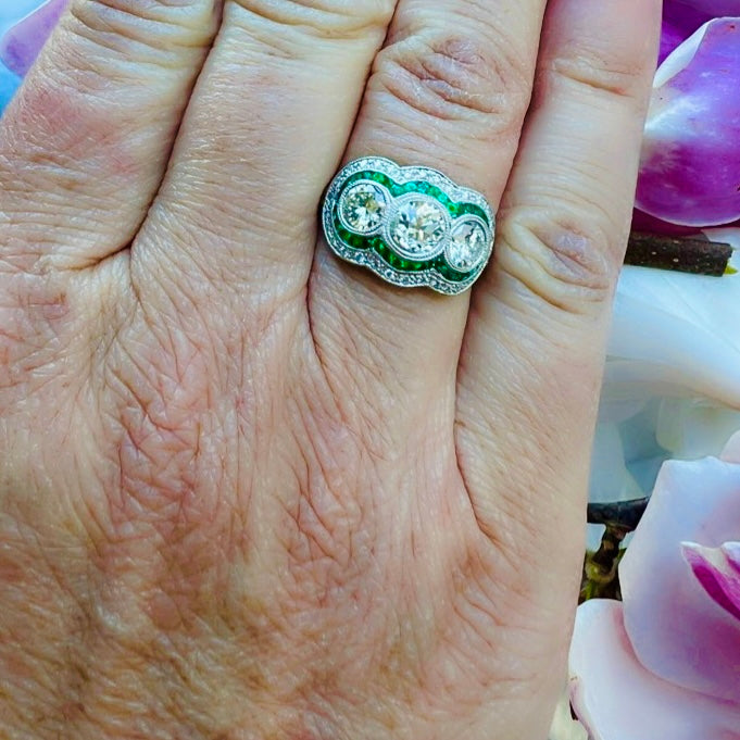 Three Stone Old Euro Diamond Ring with Emerald Halo