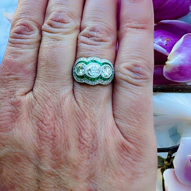 Three Stone Old Euro Diamond Ring with Emerald Halo