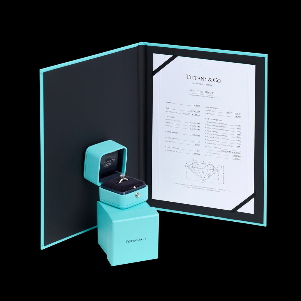 Solitaire Diamond Platinum Engagement Ring by Tiffany & Co.